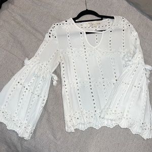 White eyelet top with tassels